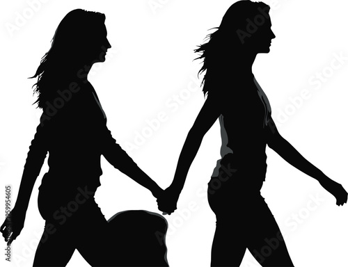 Silhouette of two young women walking together and holding hands, representing female friendship, sisterhood, lgbtq pride, partnership, and moving forward.