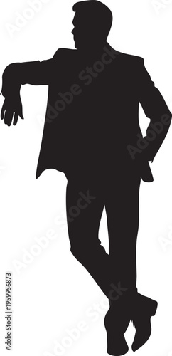 Silhouette of a man in a suit standing confidently
