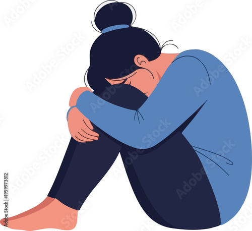 A sad woman sitting alone in a state of despair and sorrow