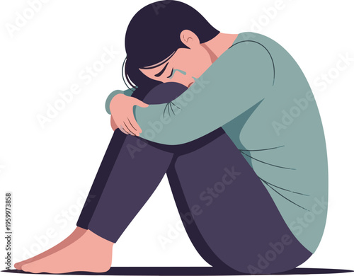 A sad woman sitting alone in a contemplative pose