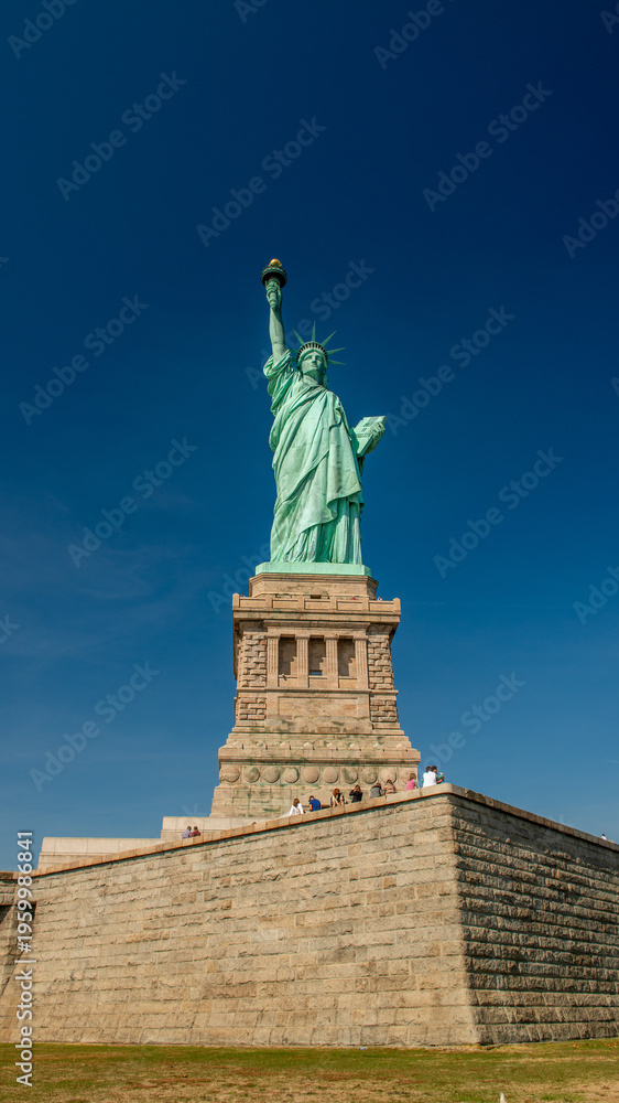 Fototapeta premium Statue of Liberty, Iconic Symbol of Freedom and Democracy in New York Harbor