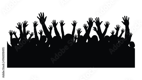 A crowd of people with their hands raised in the air