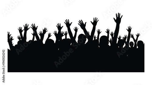 A group of people with their hands raised
