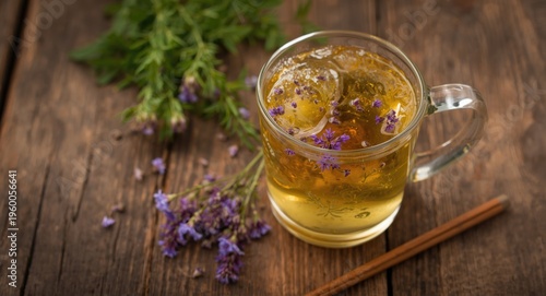 Herbal alternative medicine drink with chicory flowers served on rustic wooden table