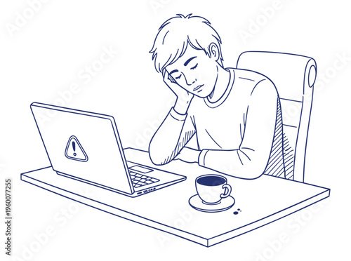 Tired young man feeling frustrated while working on a laptop at a desk with a coffee cup