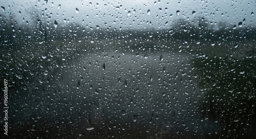 Rainwater hitting a glass w...