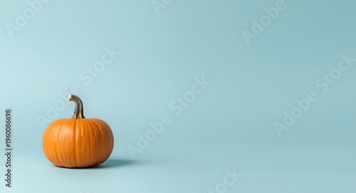 Small pumpkin in warm autum...
