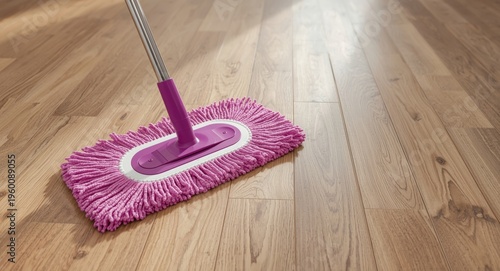 A magenta mop placed on nat...