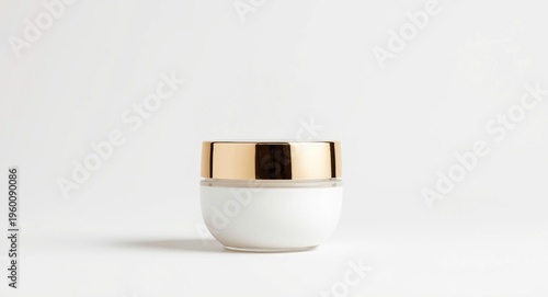 Gold topped cosmetic vessel...
