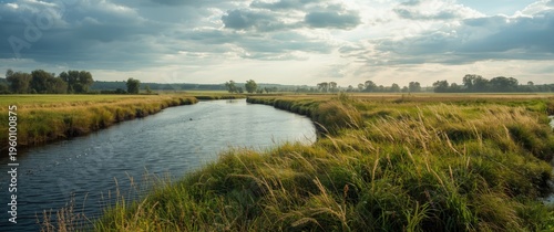Pastoral river vista with f...