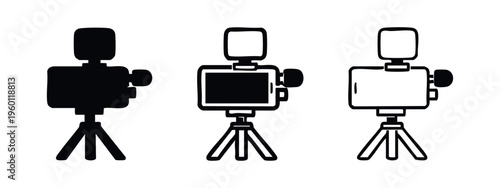 Video camera on tripod with visible screen icon set, for film production, videography, and media content
