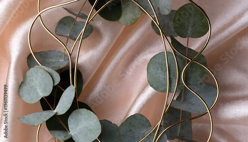 Luxury Easter frame with gold line accents, eucalyptus branches, soft blush background, empty center for text, minimal elegant style
