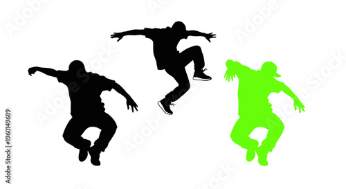 Silhouette dancers jumping and performing hip hop moves, one in neon green.