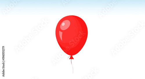 Single Red Balloon Floating Against a Light Blue Sky Background