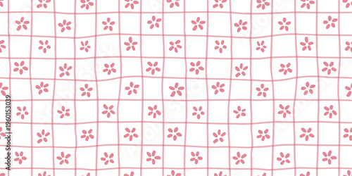 Seamless pattern with geometric grid and small flowers in soft pink pastel tones. Perfect for textile, wrapping paper, wallpaper and decorative design.