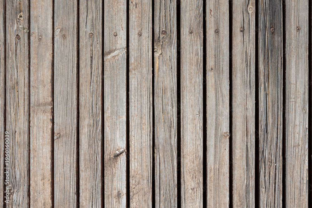 Fototapeta premium Old weathered wooden planks texture with visible nails.