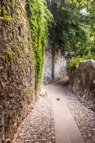 Narrow alley to the Upper Town in Bergamo, Italy