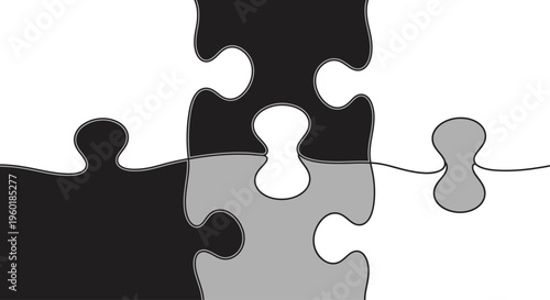 Four puzzle pieces in black white and gray representing connection and problem-solving.