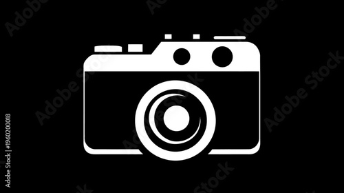Stylized white camera icon, rectangular body, lens centered. Features buttons and details on top and front