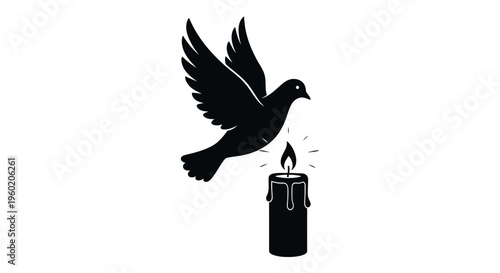 Bird flying over burning candle flame.