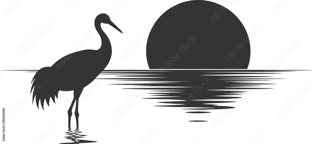 Obraz premium Serene sunset silhouette of a crane by the water's edge