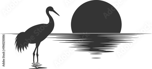 Serene sunset silhouette of a crane by the water's edge