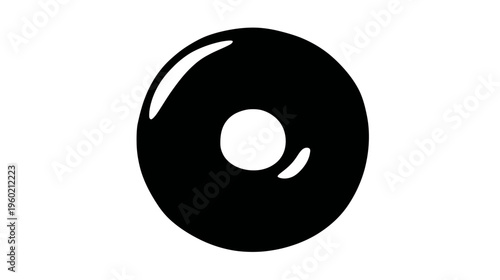 Black circular shape with a white hole and highlights, resembling a food item