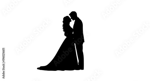 Silhouette of romantic couple embracing closely.