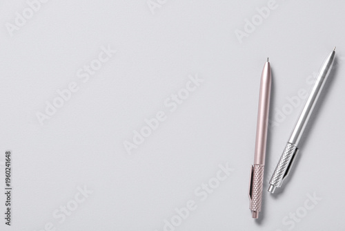 Different pens on grey back...