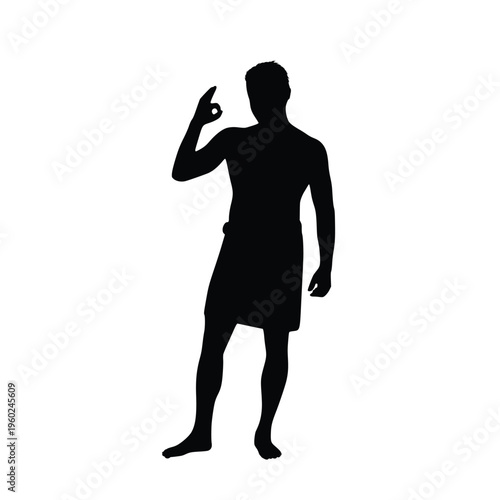 Silhouette of Athletic Man Wearing Only a Towel After Shower or Spa Standing and Showing OK Hand Gesture Concept of Health Wellness and Hygiene