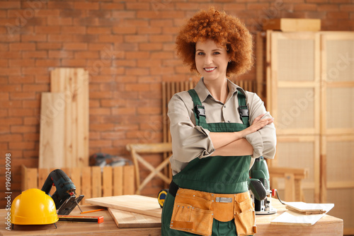 Young female carpenter in w...