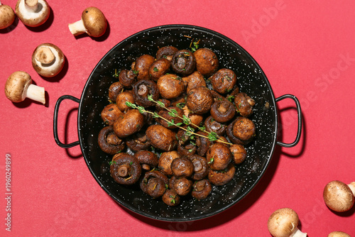 Frying pan with tasty fried...
