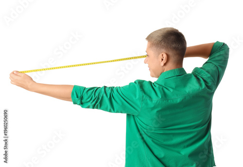Young woman with tape measu...