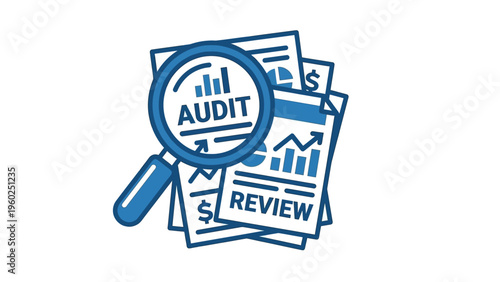 Magnifying glass on financial papers.