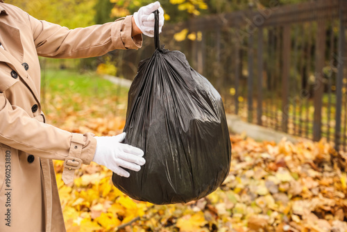 Female hands with garbage b...