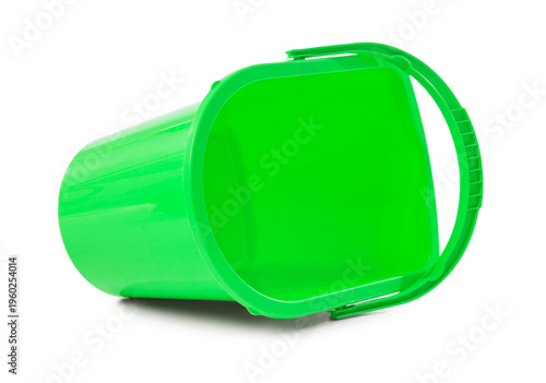 Overturned green bucket on ...