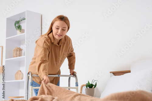 Mature woman with walker ma...