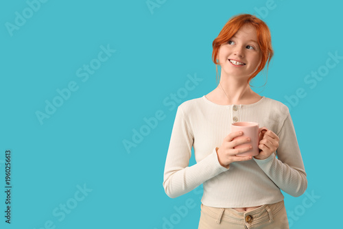 Teenage redhead girl with c...