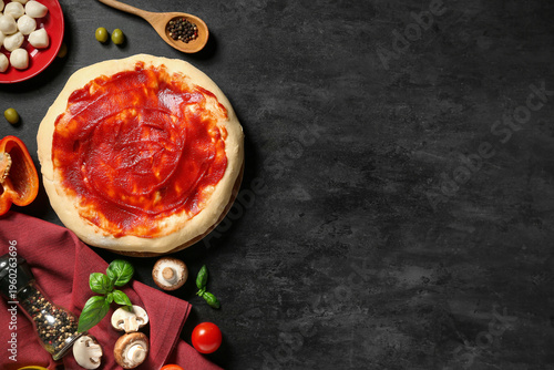 Pizza dough with tasty toma...