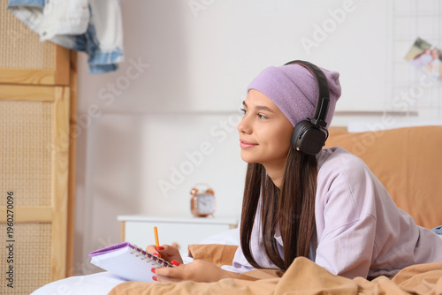 Teenage girl with headphone...