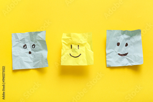 Crumpled sticky notes with ...