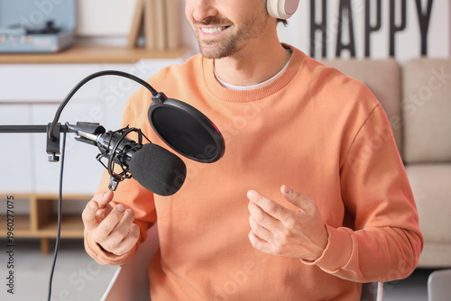 Male radio presenter with m...