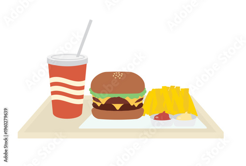 シンプルなチーズバーガーとフレンチフライとジュースのセット