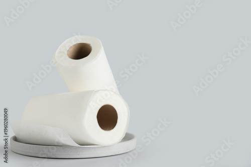 Plate with rolls of paper t...