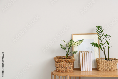 Wicker baskets with plants,...