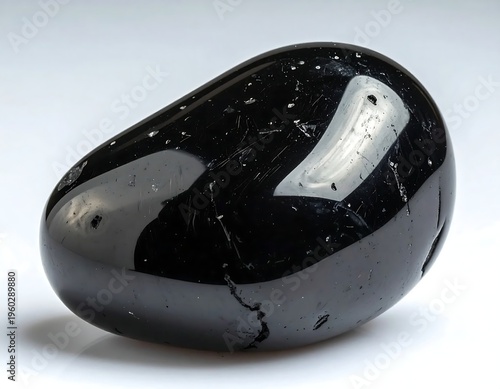 Polished Obsidian Stone - A Glimpse into Volcanic Glass Formation.