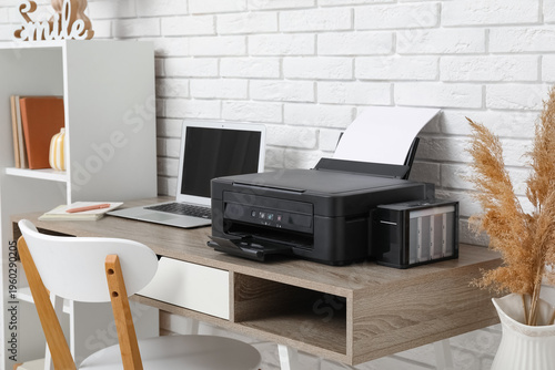 Modern printer with laptop ...