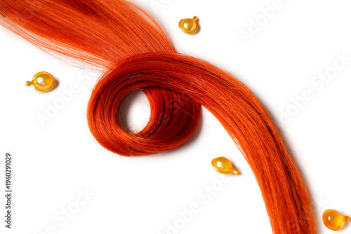 Red hair strand and capsule...