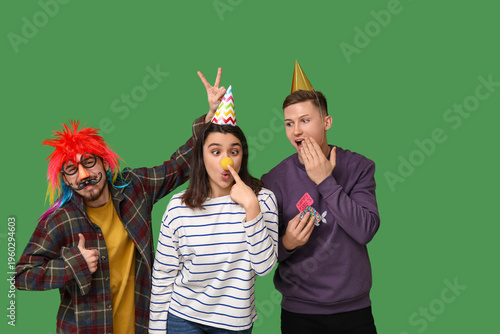 Young friends in funny disg...