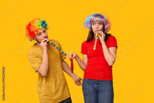 Young friends in funny disg...